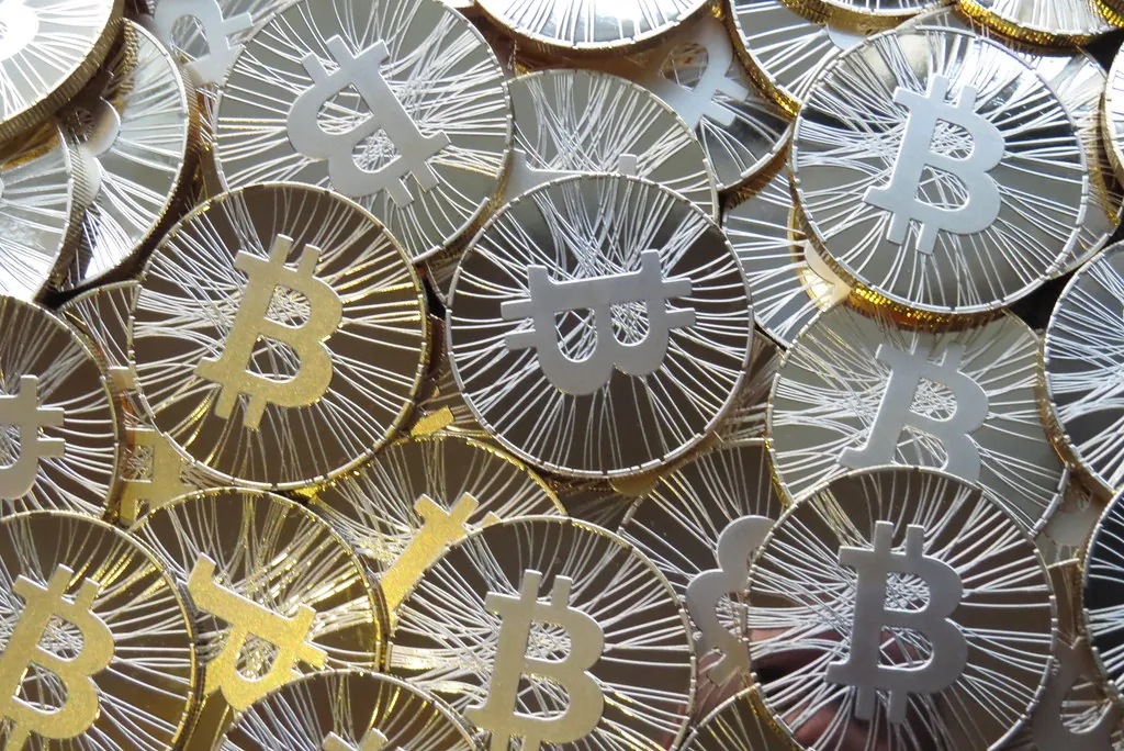 Pile of physical souvenir Bitcoin coins
