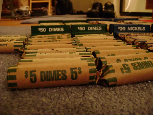 Rolls of U.S. dimes and nickels in paper coin wrappers