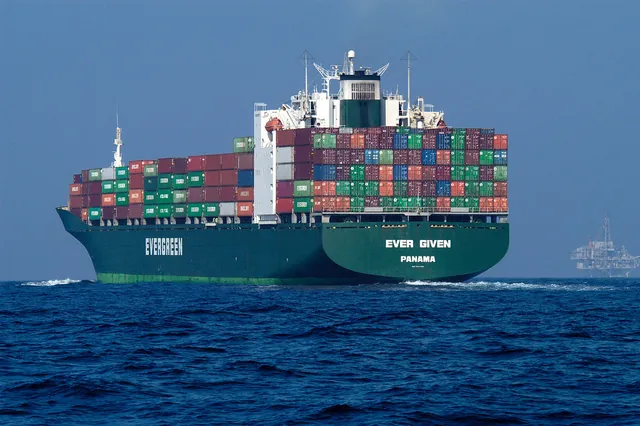 A fully loaded container ship at sea
