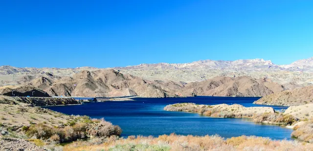 Lake Mohave behind Davis Dam, a blue lake among desert hills
