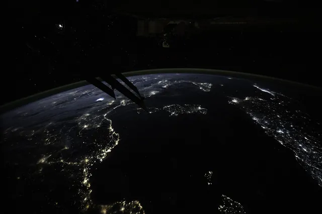 City lights along the Mediterranean Sea at night, seen from the International Space Station