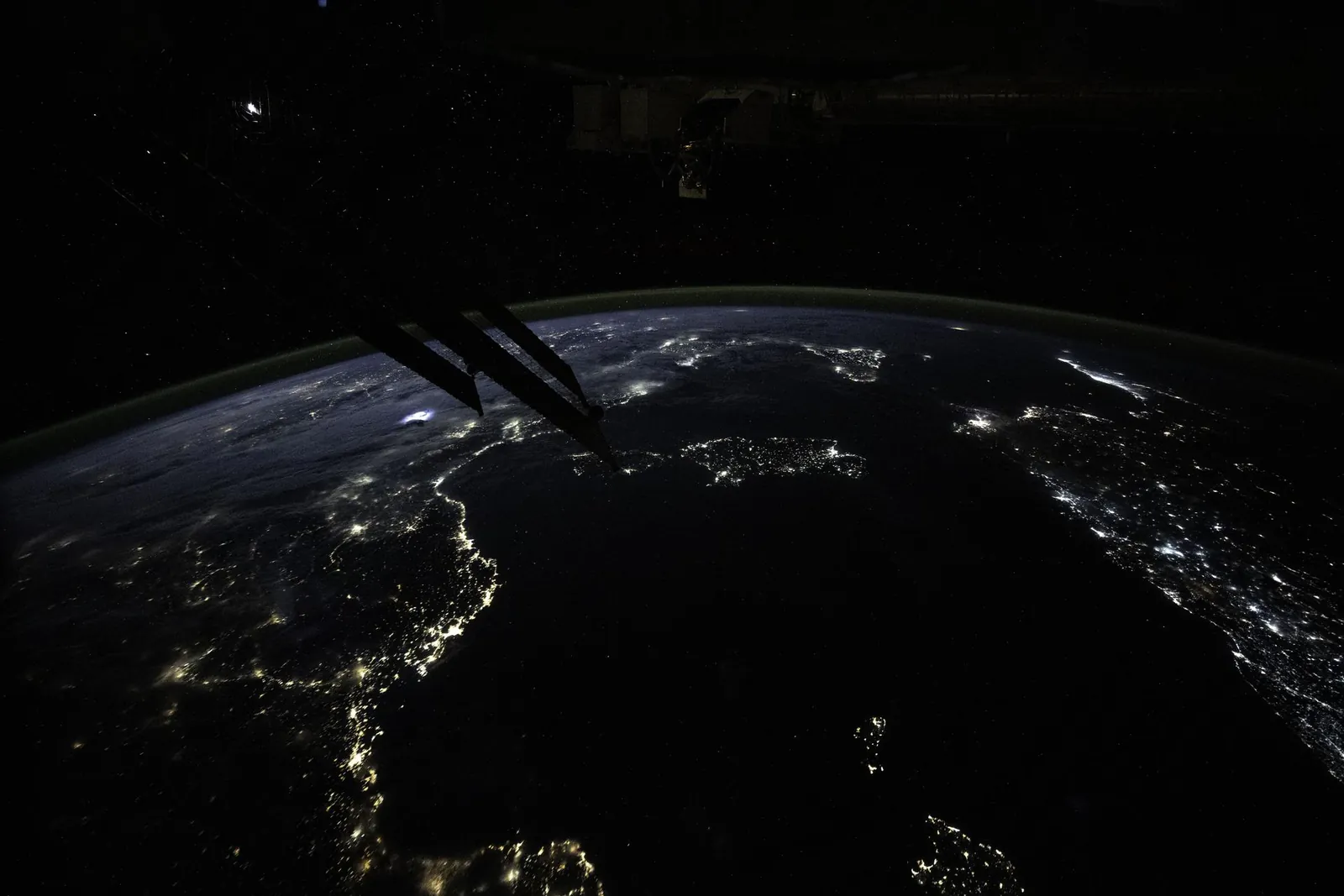 City lights along the Mediterranean Sea at night, seen from the International Space Station