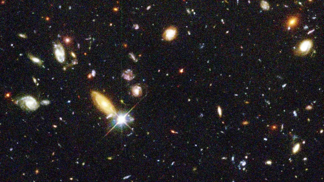 Hubble Deep Field, showing hundreds of distant galaxies