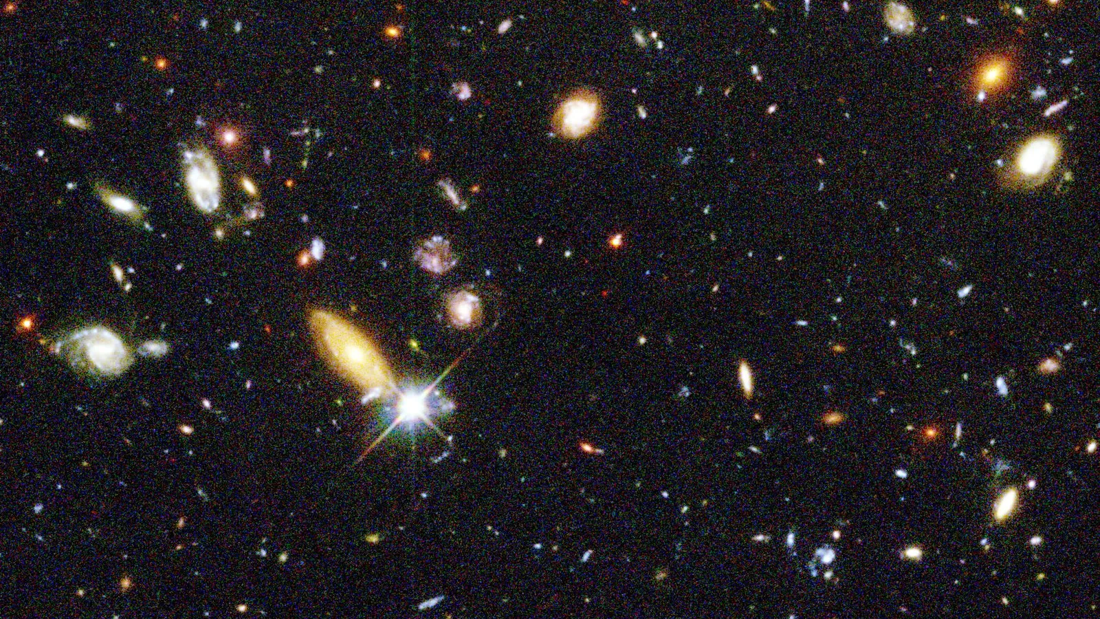 Hubble Deep Field, showing hundreds of distant galaxies