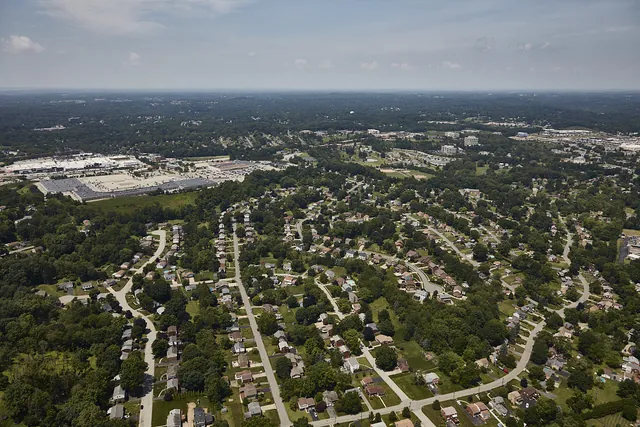 Aerial view of suburban homes and tree-lined streets near Pittsburgh