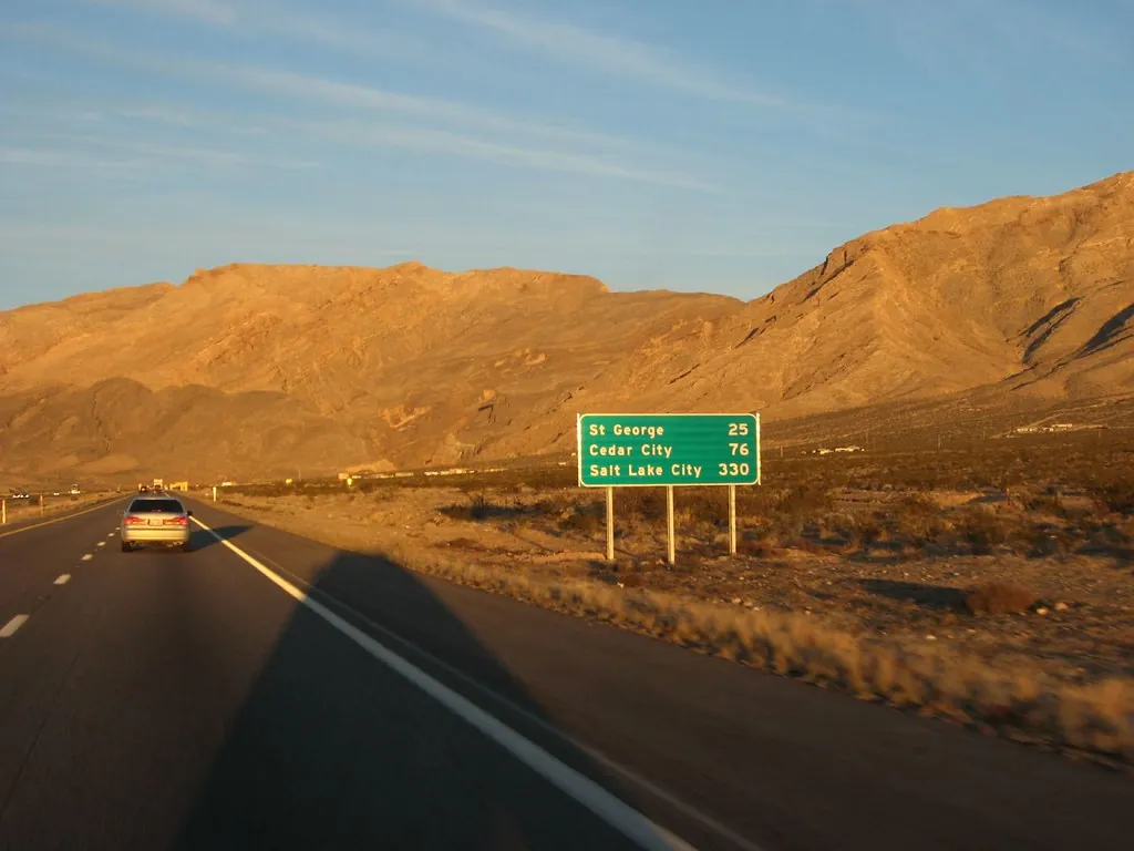 Interstate 15 through golden desert mountains between Mesquite and St. George